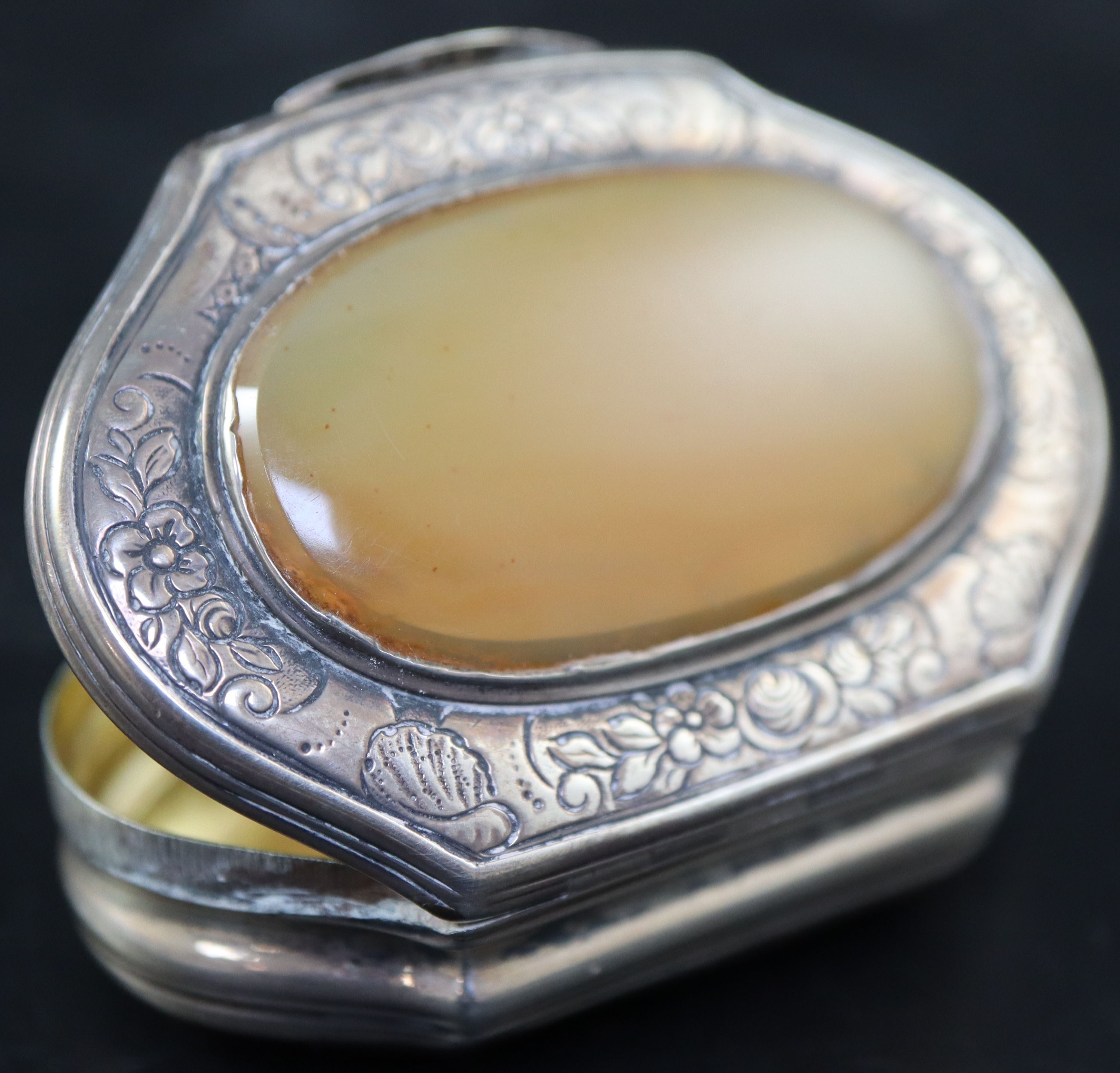 A 19th century Continental engraved white metal snuff box, 57mm, gross 31 grams.